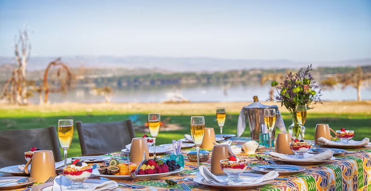 Chui Lodge bush breakfast setup overlooking Lake Naivasha